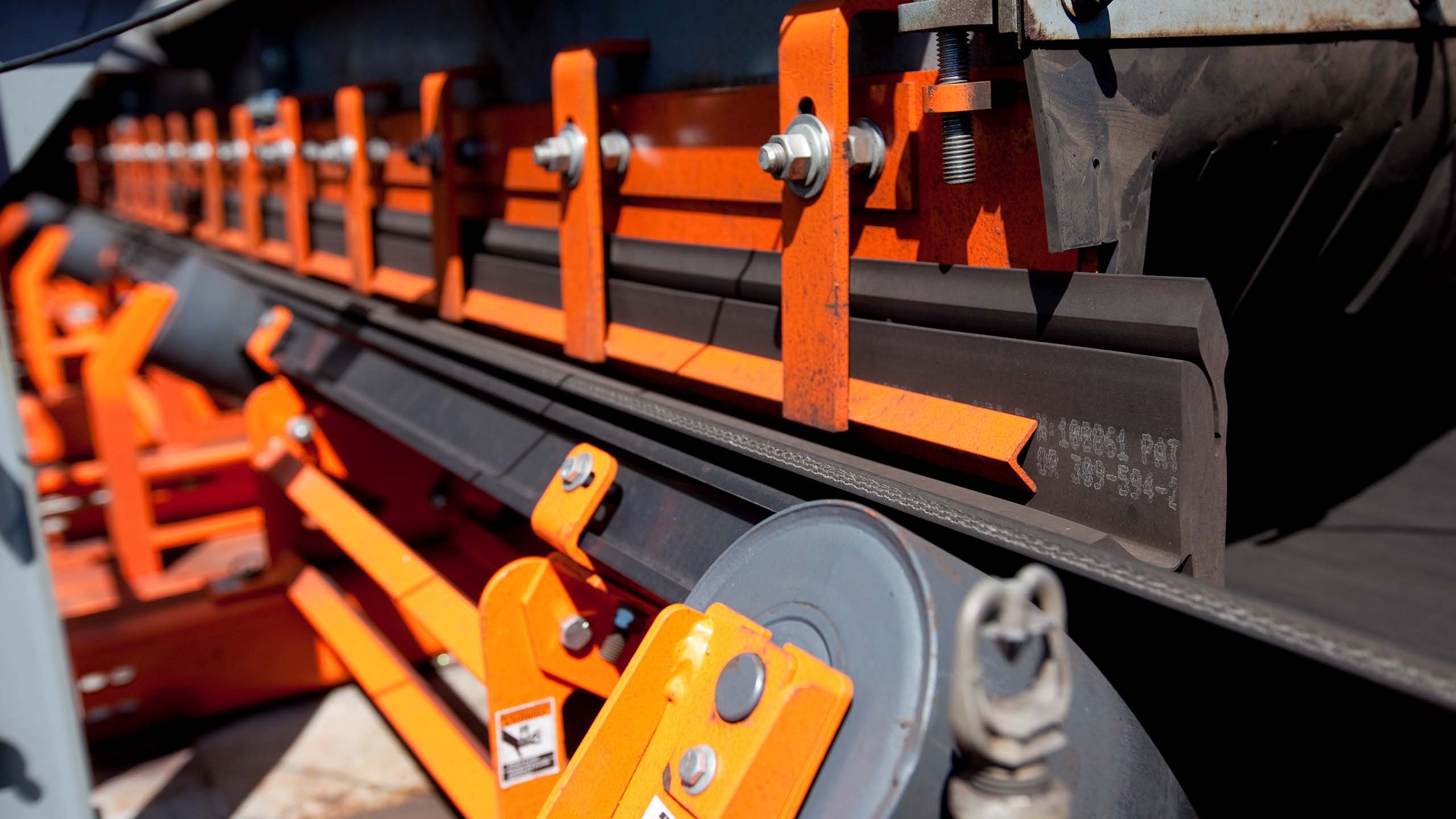 Conveyor impact cradles protect belts from damage