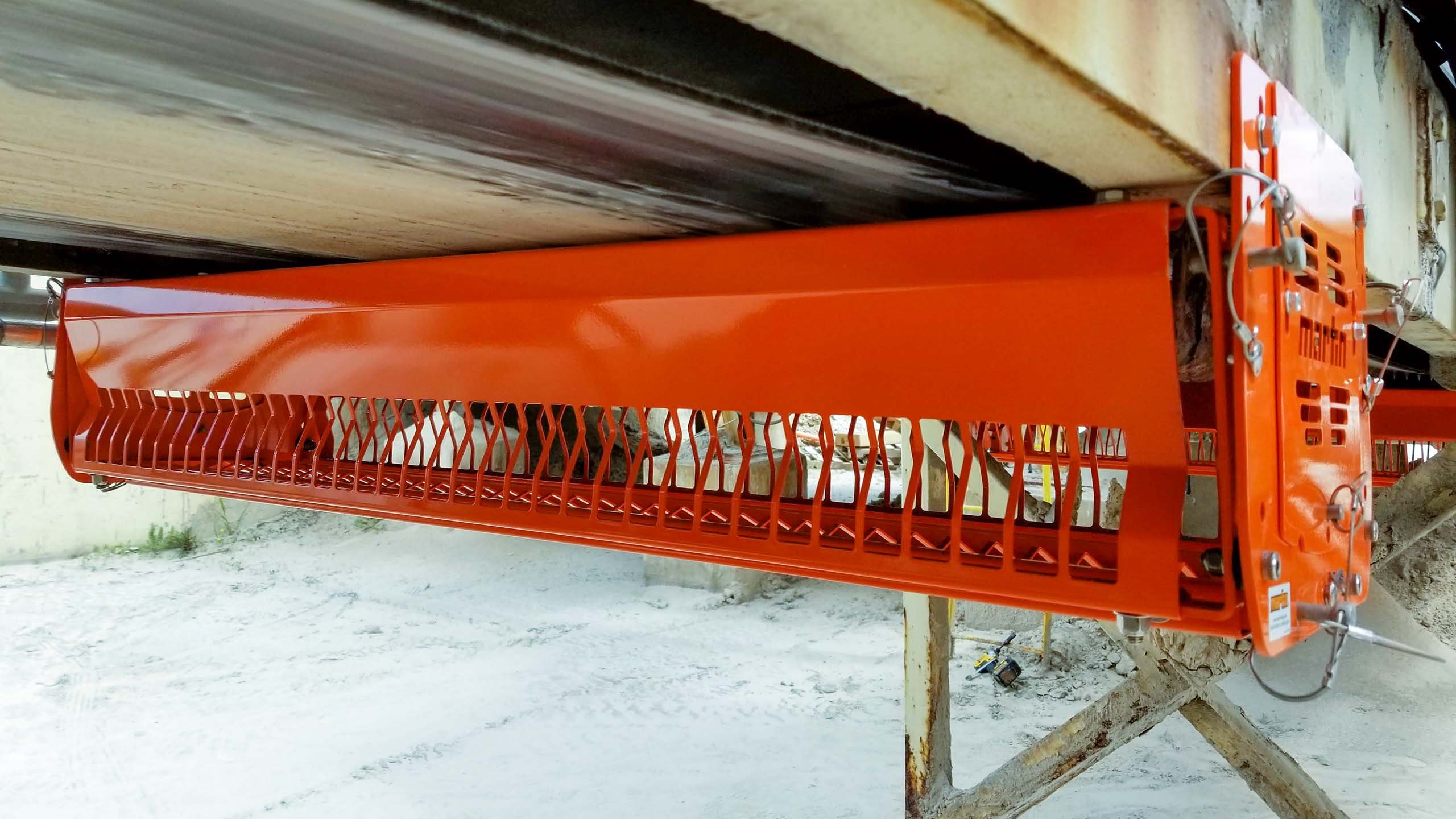 Return Roll Guard installed on a belt conveyor.