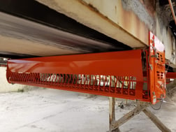 Return Roll Guard installed on a belt conveyor.