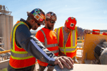 People, Talking, Looking, Hard Hats, Safety Glasses, Safety Vests