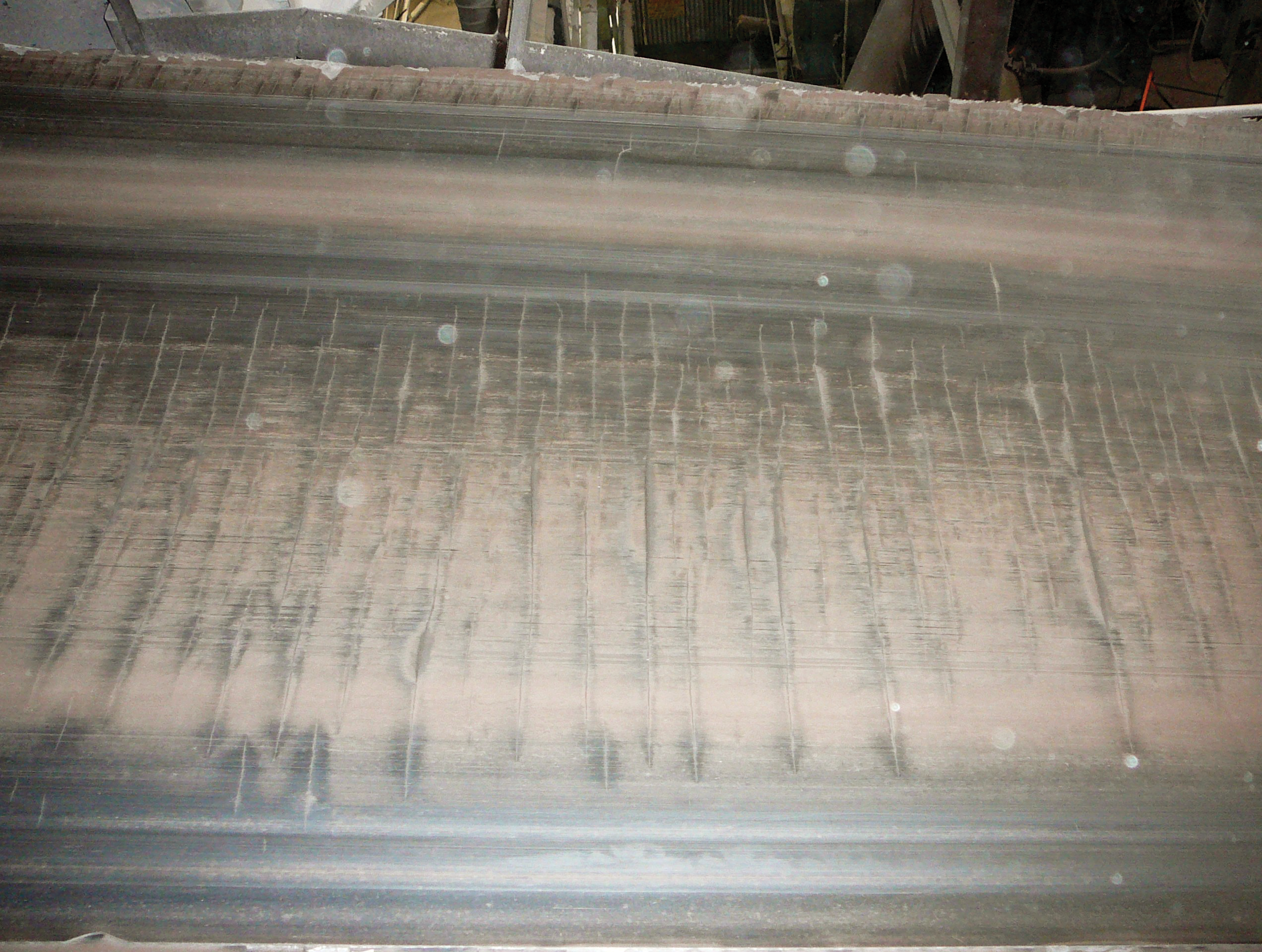 Conveyor belt top cover cracking.